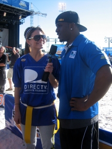 Maria and her coach, Reggie Bush, go over some game details