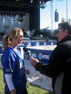 Stacy Keibler chats with Access on the sidelines during the game