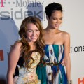 Miley and Rihanna share a red carpet moment at the Clive Davis pre-Grammy bash