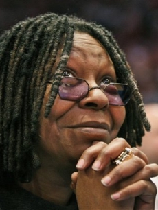 Whoopi Goldberg watches the New York Knicks play the Cleveland Cavaliers at Madison Square Garden