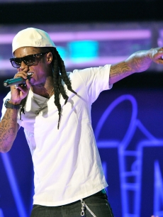 Lil Wayne works the crowd during his performance