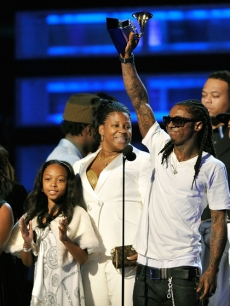 Lil Wayne hoists the Grammy for Best Rap Album for ‘Tha Carter III’