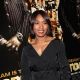 Angela Bassett poses for a photo while attending the ‘Notorious’ VIP Screening at the Soho Hotel on February 09, 2009 in London, England