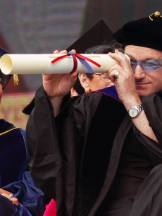 Bono, lead singer and songwriter for the rock group U2 and a social-justice activist, receives an honorary Doctor of Laws degree at the 248th Commencement of the University of Pennsylvania, on May 17, 2004 in Ph