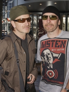 Bono and The Edge of U2 attend The Nelson Mandela Foundation’s ‘46664 Give One minute to Aids’ Concert at The Greenpoint Stadium on November 29, 2003 in Cape Town