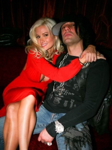 Holly Madison and Criss Angel cuddle up inside LAX Nightclub in Las Vegas on Valentine’s Day