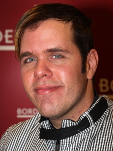 Perez Hilton poses as he signs copies of ‘Red Carpet Suicide’ at Borders in Columbus Circle on January 6, 2009 in New York City