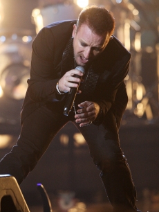 U2 perform at the Brit Awards in London