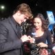 Laura gets a  leafy “proposal’ from Robert Pattinson at the “Twilight” premiere