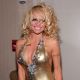Pamela Anderson poses backstage at the Richie Rich Fall 2009 fashion show during Mercedes-Benz Fashion Week at the Waldorf Astoria