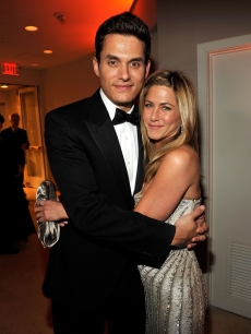 John Mayer and Jennifer Aniston cuddle up at the Vanity Fair Oscar party