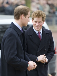 Prince William and Prince Harry attend the unveiling of a statue and bronze reliefs of Queen Elizabeth, the Queen Mother, on the Mall