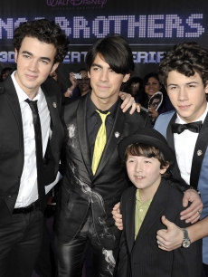 Kevin Jonas, Joe Jonas, Frank Jonas and Nick Jonas arrive at Walt Disney Picture’s ‘Jonas Brothers 3D Concert Experience’