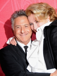 Dustin Hoffman and Emma Thompson share a hug at the Cesar Film Awards in Paris, Feb. 27, 2009