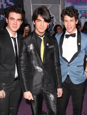 Kevin Jonas, Joe Jonas, and Nick Jonas of The Jonas Brothers arrive at ‘Jonas Brothers: The 3D Concert Experience’ in Hollywood
