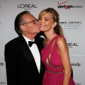 Larry King kisses wife Shawn Southwick-King as they arrive at the Clive Davis pre-Grammy party held at the Beverly Hilton on February 10, 2007 in Beverly Hills, California