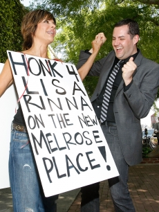 Lisa Rinna (L) and Ross Matthews campaign to get Lisa on ‘Melrose Place’ on the corner of Melrose Ave and Melrose Place on March 18, 2009 in Los Angeles