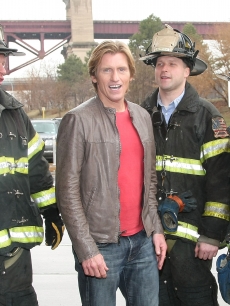 Denis Leary poses with FDNY Firefighters during the dedication and demonstration of The Leary Firefighters Foundation’s high-rise training simulator at FDNY Training Academy