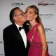 Larry King kisses wife Shawn Southwick-King as they arrive at the Clive Davis pre-Grammy party held at the Beverly Hilton on February 10, 2007 in Beverly Hills, California
