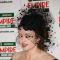 Helena Bonham Carter poses with her best actress award in the press room at The Jameson Empire Magazine Awards