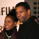 Pauletta Washington (L) and her husband actor Denzel Washington arrive at the MGM premiere of ‘The Great Debaters’ held at the Arclight Cinerama Dome on December 11, 2007