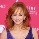 Reba McEntire is pretty in purple as she arrives to the 44th Annual Academy of Country Music Awards