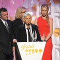 Ellen DeGeneres, with wife Portia de Rossi, accepts the award for Outstanding Talk Show Episode at the 20th Annual GLAAD Media Awards in LA