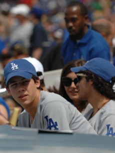 Nick Jonas, Camilla Belle and Joe Jonas at the Dogers opening day