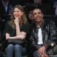Ellen Pompeo and Chris Ivery at a Lakers game, March 2009