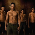 Alex Meraz (Paul), Chaske Spencer (Sam Uley), Bronson Pelletier (Jared), and Kiowa Gordon (Embry) stand as the ‘New Moon’ wolf pack