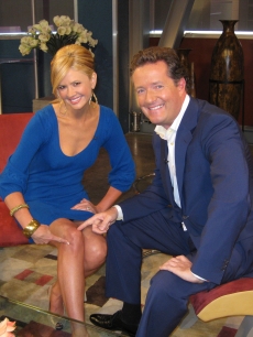 Nancy O’Dell and ‘Britain’s Got Talent’ judge Piers Morgan pose on the Access stage
