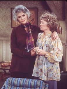 Beatrice Arthur (as Maude Findlay) (left) comforts a distraught Rue McClanahan (as Vivian Cavender Harmon) in a scene from the television show ‘Maude,’ Los Angeles, California, mid 1970s