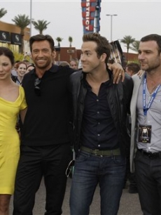 Will.i.am, Lynn Collins, Hugh Jackman, Ryan Reynolds, Liev Schreiber and Taylor Kitsch arrive for the world premiere of “X-Men Origins: Wolverine” Monday, April 27, 2009, in Tempe, Ariz