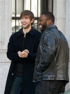 Chace Crawford and Curtis “50 Cent” Jackson laugh between takes on the set of “Twelve” on April 27, 2009 in New York