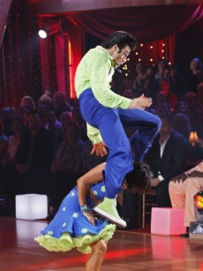Gilles Marini and Cheryl Burke take flight while doing the lindy hop