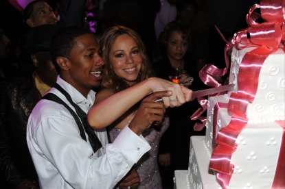 Mariah Carey & Nick Cannon cut their One-year Anniversary cake at the Palms Casino Resort