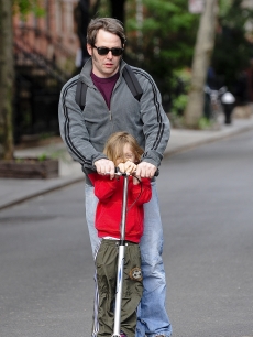 Matthew Broderick rides a scootler with his son James Wilkie Broderick to school on May 11, 2009 in New York City