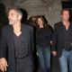 George Clooney, Cindy Crawford and Rande Gerber stand on a sidewalk in the early morning October 9, 2007 in New York City