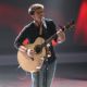 Kris Allen performs on ‘American Idol’ as the final three battle it out, May 12, 2009