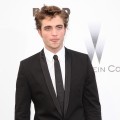‘Twilight’ vampire Robert Pattinson sticks out his tongue at the amfAR Cinema Against AIDS 2009 benefit at the Hotel du Cap during the 62nd Annual Cannes Film Festival on May 21, 2009 