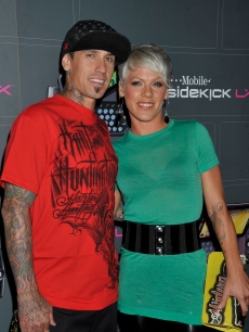 Carey Hart and Pink arrive at the T-Mobile Sidekick LX launch event at Paramount Studios on May 14, 2009 in Hollywood