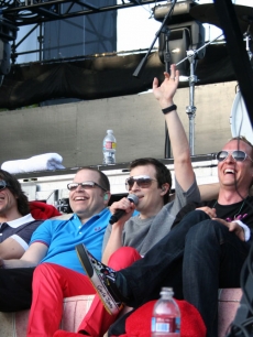 The men of Weezer wave to the fans at the KROQ Weenie Roast, May 16, 2009, Irvine, Calif.