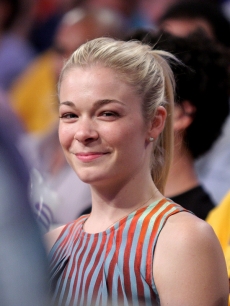 LeAnn Rimes is all smiles watching the Lakers beat the Houston Rockets in Game 7 of the Western Conference Finals on May 17, 2009