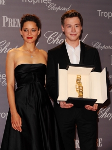 Marion Cotillard presents the award to actor David Kross at The Chopard Trophy held at the Martinez Hotel during the 62nd International Cannes Film Festival on May 18th, 2009