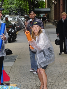 Kelly Ripa shoots water squirt gun on the ‘Live With Regis And Kelly’ taping at ABC Lincoln Square Studio on May 18, 2009 in New York City