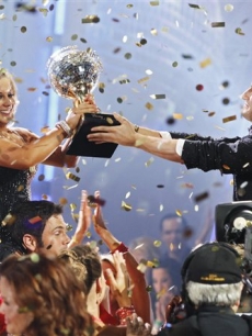 Shawn Johnson and Mark Ballas hold the trophy during ‘Dancing with the Stars’ finale show