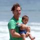 Matthew McConaughey plays with son Levi at the beach on May 13, 2009 in Malibu, California