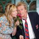 Penny Lancaster and Rod Stewart pose for a photograph at the preview day at Chelsea Flower Show at Royal Hospital Chelsea on May 18, 2009 in London, England