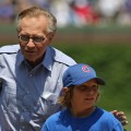 Larry King and son Chance appear before a game between the Chicago Cubs and the Los Angeles Dodgers on May 29, 2009 at Wrigley Field in Chicago, Illinois