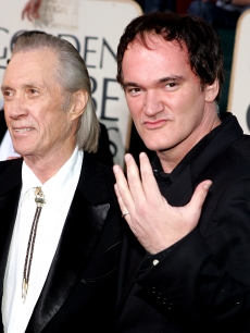 David Carradine with ‘Kill Bill’ director Quentin Tarantino arrives to the 62nd Annual Golden Globe Awards at the Beverly Hilton Hotel January 16, 2005 in Beverly Hills